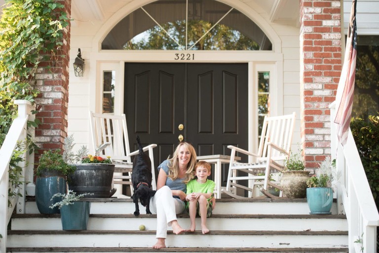 El Dorado Hills photographer sits on her porch with son and dog