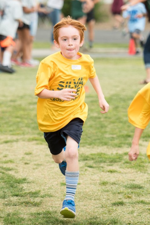 A boy runs cross country in El Dorado Hills